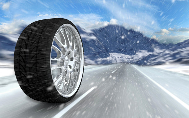 Snowy road mountain tire sky free wallpaper - medium preview image