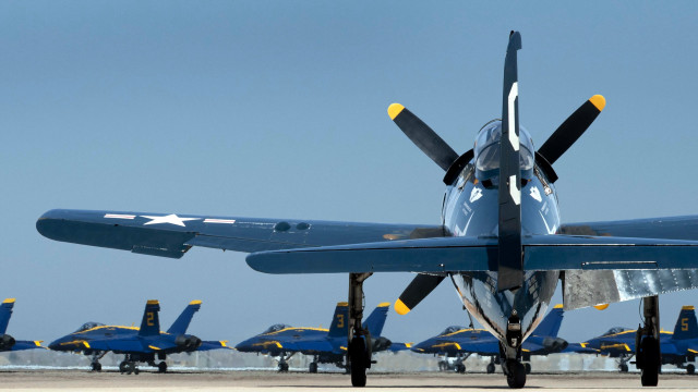 Large blue airplane propellers precisionism free wallpaper - medium preview image