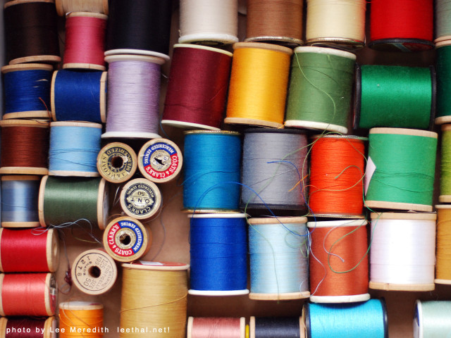 Spools of thread wall shelf free wallpaper - medium preview image