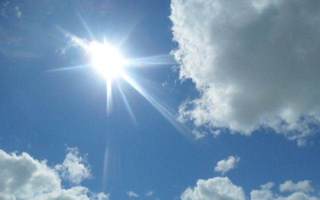 Bright sun clouds blue sky free wallpaper - medium preview image