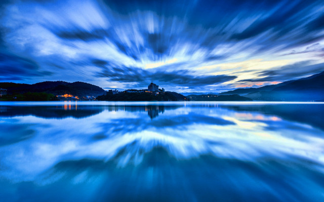 Blue sky clouds island church free wallpaper - medium preview image