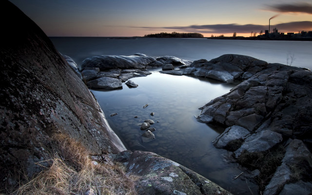 Dusk ocean rocks grass city free wallpaper - medium preview image