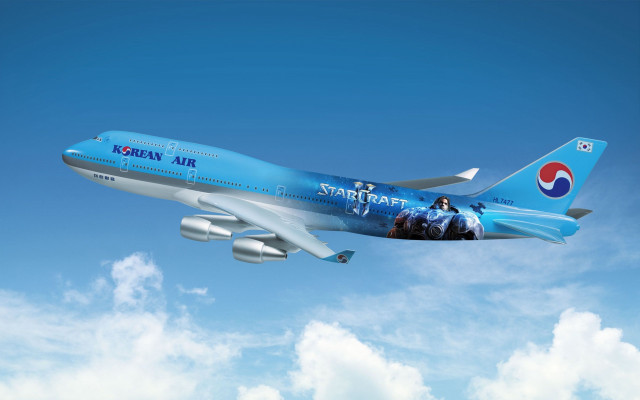 Large blue airplane clouds sky free wallpaper - medium preview image