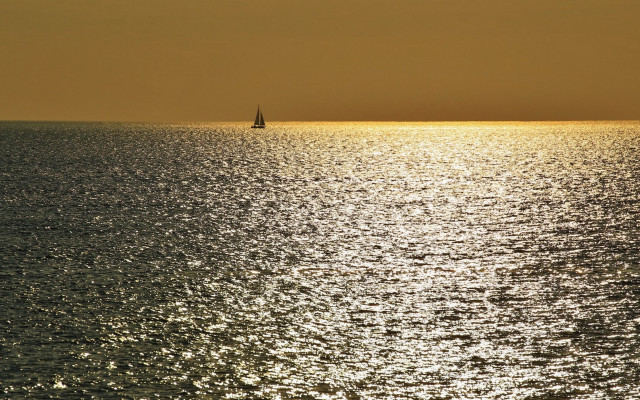 Sailboat sunset ocean impressionist depth free wallpaper - medium preview image