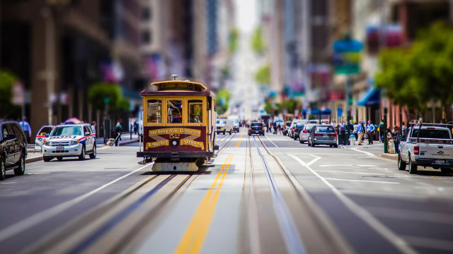 Trolley bus city street blur free wallpaper - medium preview image
