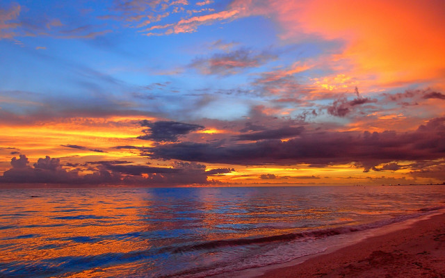 Sunset ocean clouds beach boat free wallpaper - medium preview image