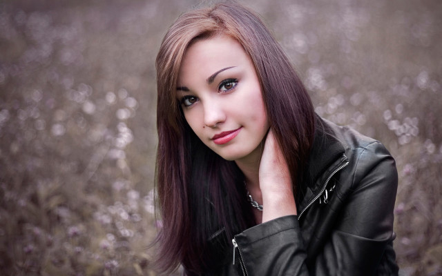 Woman longhair leatherjacket flowerfield portrait free wallpaper - medium preview image