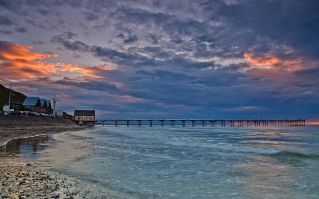 Sunset pier beach waves cloudy free wallpaper - medium preview image