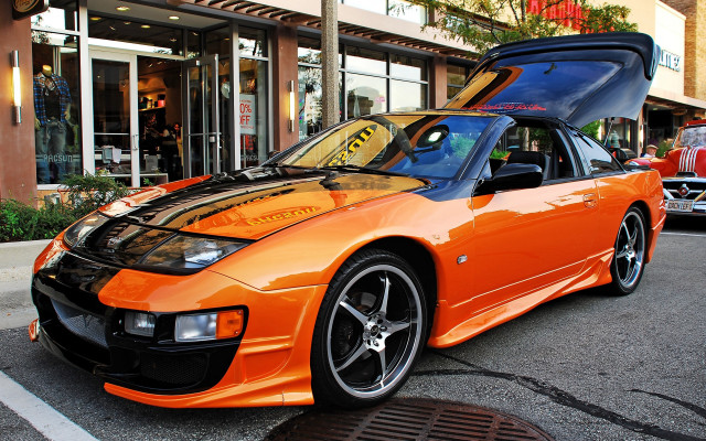 Car parked open road storefront free wallpaper - medium preview image