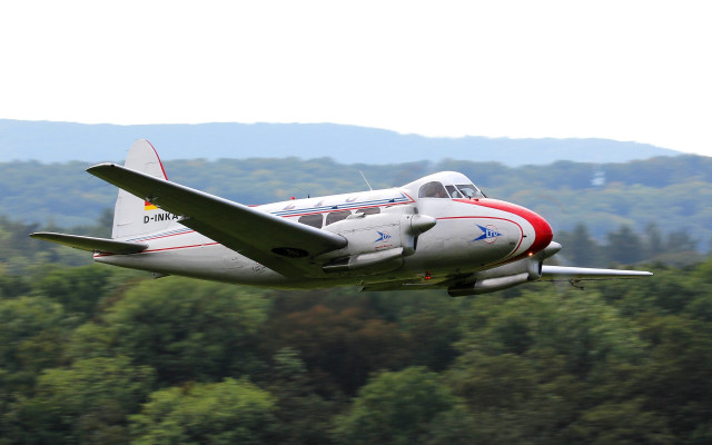 Small airplane forest mountain sunny free wallpaper - medium preview image