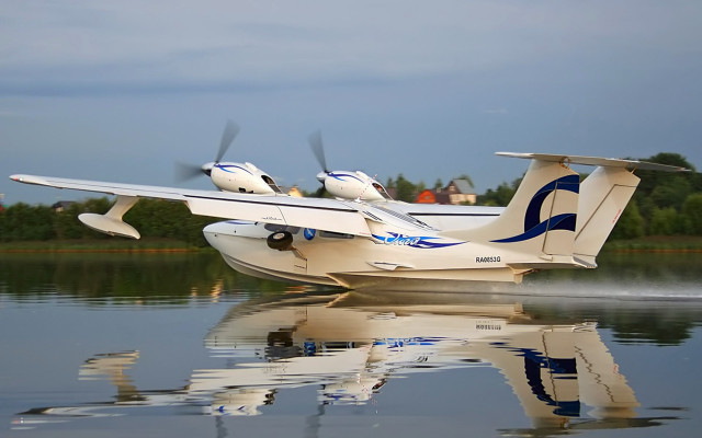 Small plane water birds ocean free wallpaper - medium preview image