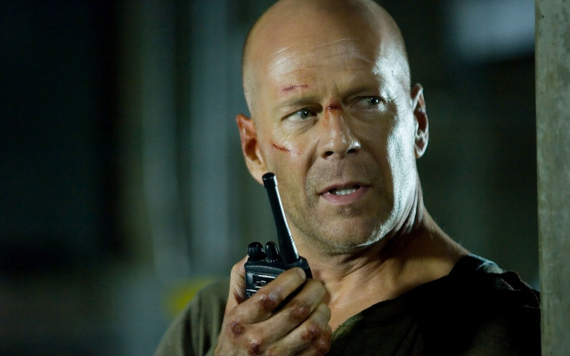 Bald man camera serious portrait free wallpaper - medium preview image