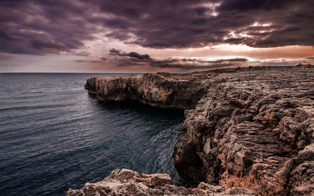 Rocky cliff water cloudy sky #2 free wallpaper - medium preview image