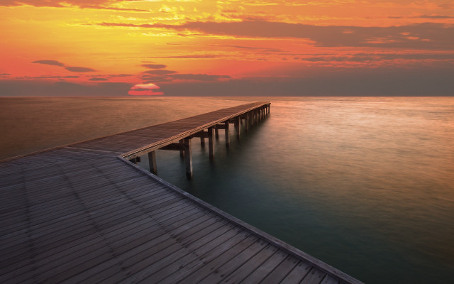 Pier sunset ocean clouds mountain free wallpaper - medium preview image