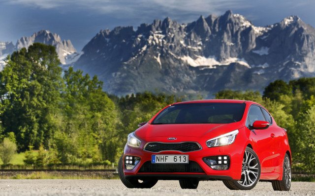 Red car mountain sky trees free wallpaper - medium preview image