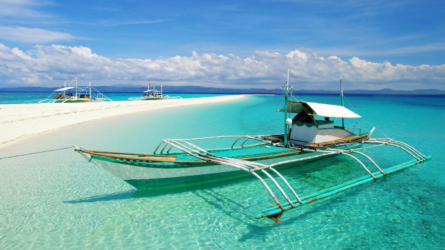 Beach boat ocean clouds saturated free wallpaper - medium preview image