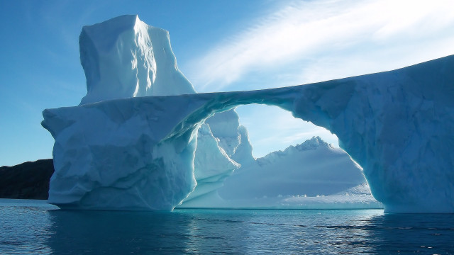 Iceberg mountain ocean sky clouds free wallpaper - medium preview image