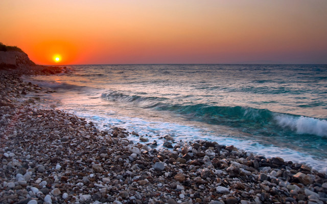 Sunset ocean wave beach rock free wallpaper - medium preview image