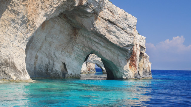 Large rock formation ocean landscape free wallpaper - medium preview image