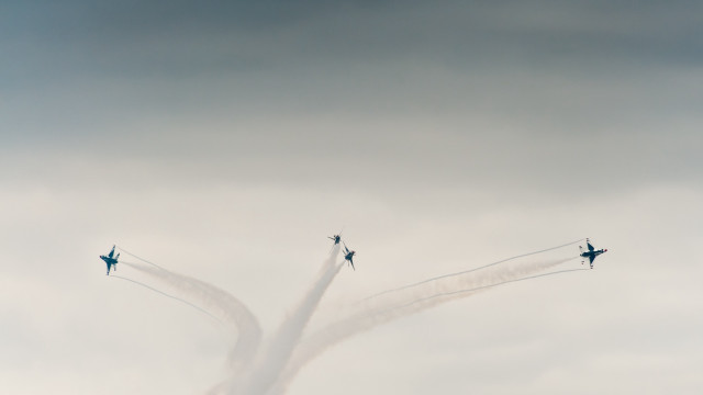 Airplanes cloudy sky smoke trailing free wallpaper - medium preview image