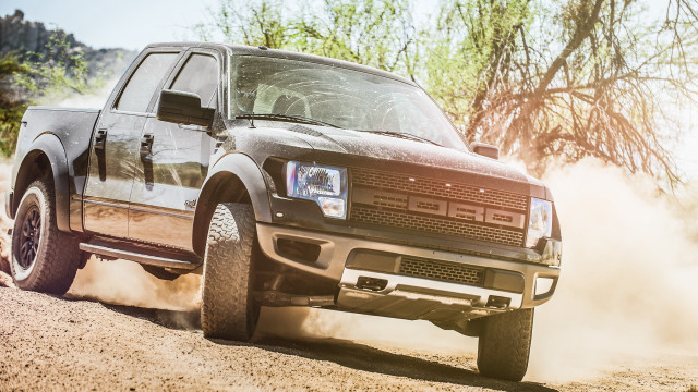 Dusty truck tiltshift photorealism nature free wallpaper - medium preview image