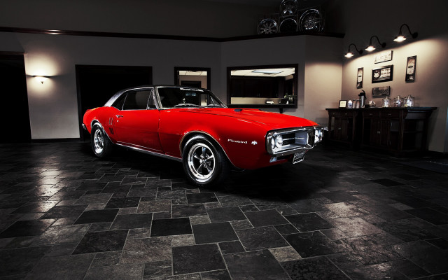 Red car parked black tile free wallpaper - medium preview image