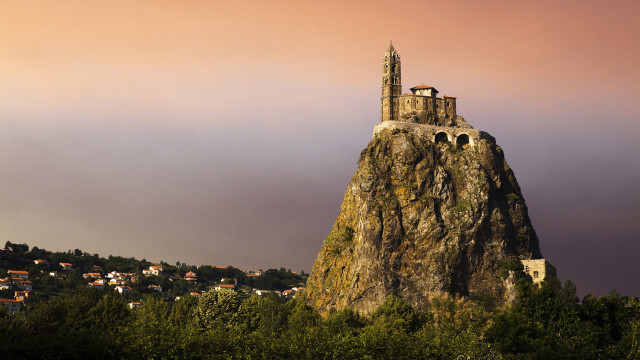 Large rock tower village cloudy free wallpaper - medium preview image