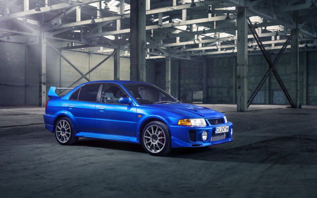 Blue car parking garage windowed free wallpaper - medium preview image