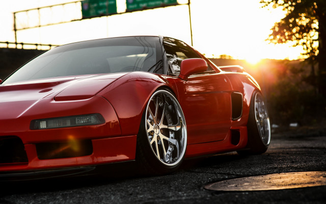 Red sports car sunset front free wallpaper - medium preview image