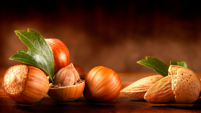 Nuts leaves table brown background free wallpaper - medium preview image