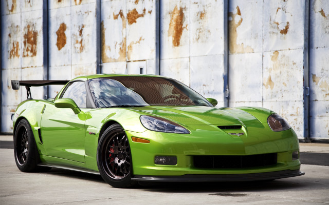 Green sports car rusty wall #2 free wallpaper - medium preview image