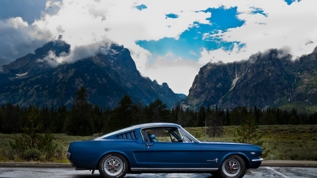 Blue mustang parking lot mountains free wallpaper - medium preview image