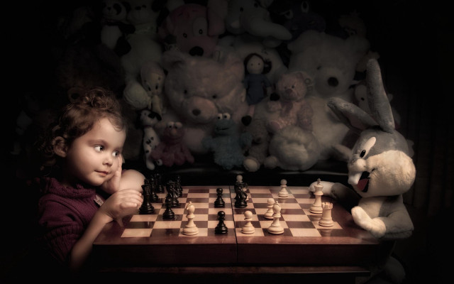 Little girl playing chess stuffed free wallpaper - medium preview image