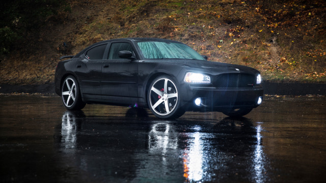 Black car wet road hillside #2 free wallpaper - medium preview image