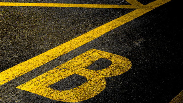 Yellow black parking sign astronaut free wallpaper - medium preview image