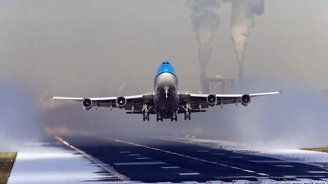 Jetliner cloudy sky smoke runway free wallpaper - medium preview image