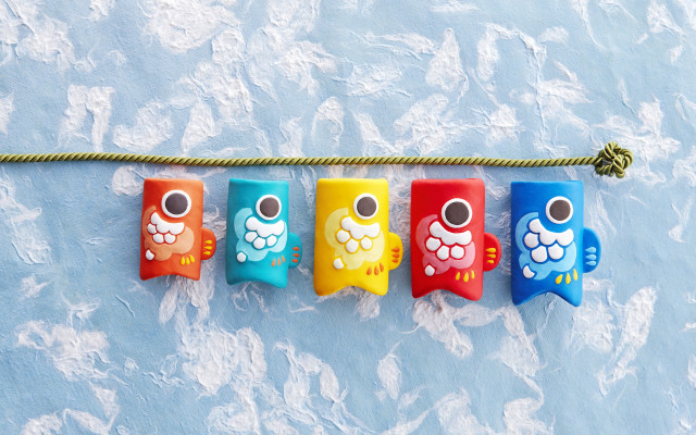Colorful toothbrushes hanging blue clouds free wallpaper - medium preview image