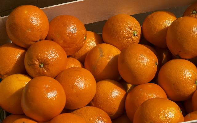Oranges box tabletop green stem free wallpaper - medium preview image
