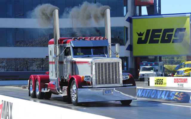 Semi truck smoke building precisionism free wallpaper - medium preview image