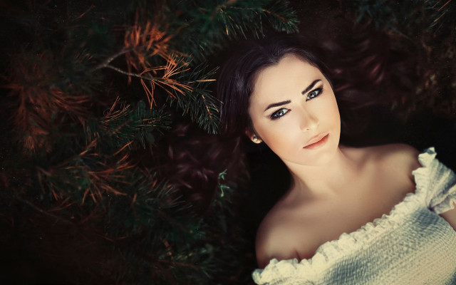 Woman white top pine branch free wallpaper - medium preview image