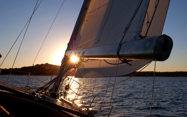 Sailboat sunset lake island reflection free wallpaper - medium preview image