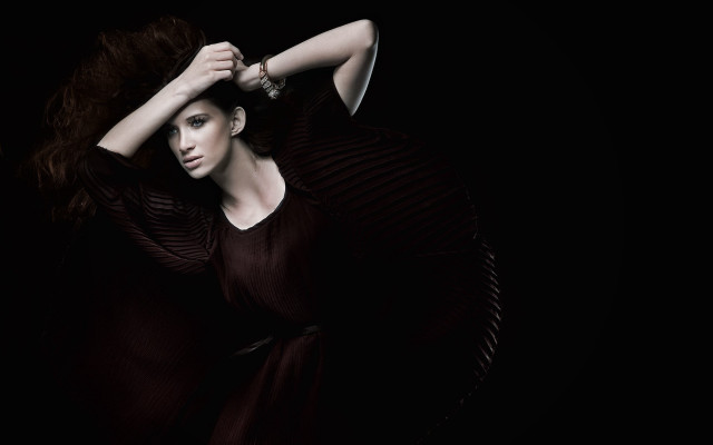 Woman black dress holding hair #2 free wallpaper - medium preview image