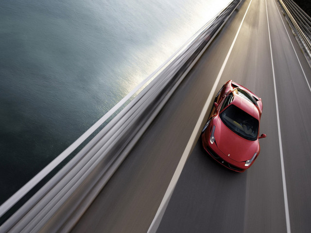 Red sports car highway water free wallpaper - medium preview image