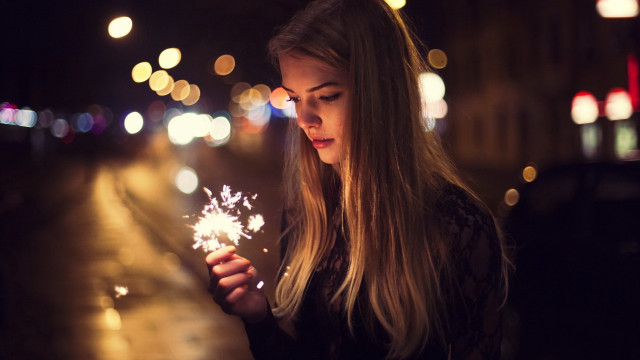 Woman sparkler night street christmas free wallpaper - medium preview image