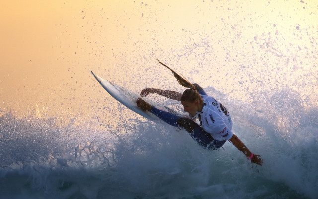 Surfer riding wave ocean sunset #4 free wallpaper - medium preview image