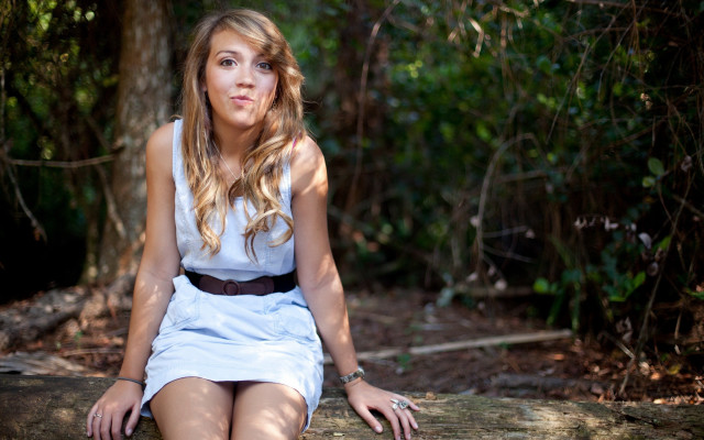 Woman forest smiling sitting dappled free wallpaper - medium preview image