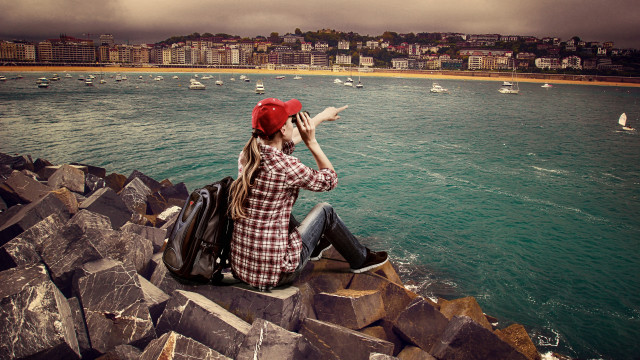 Woman rock wall water boats free wallpaper - medium preview image