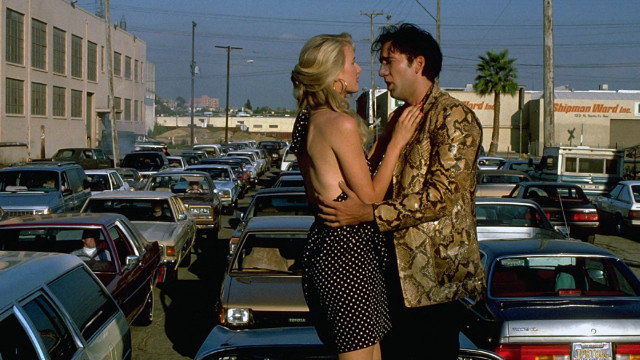 Man woman parking lot cars free wallpaper - medium preview image