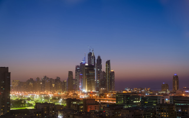 City skyline night tall buildings free wallpaper - medium preview image