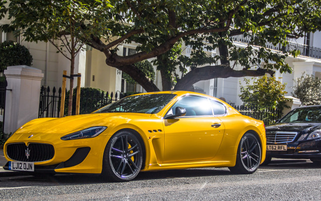 Yellow sports car city street #4 free wallpaper - medium preview image